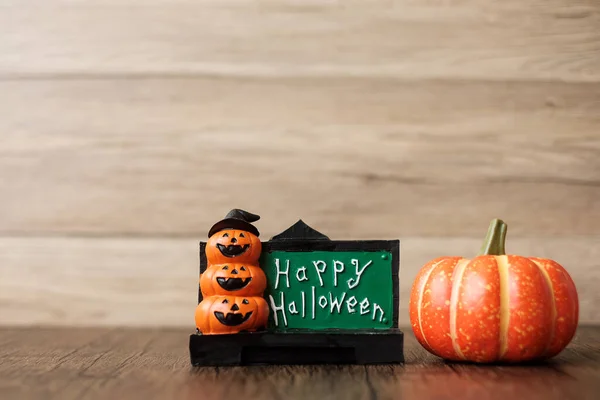 Orange pumpkin on table with copy space for banner background. Happy Halloween day, Hello October, fall autumn season, Festive, party and holiday concept