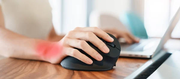 woman hand using computer ergonomic mouse, prevention wrist pain because working long time. De Quervain s tenosynovitis, Intersection Symptom, Carpal Tunnel Syndrome or Office syndrome concept