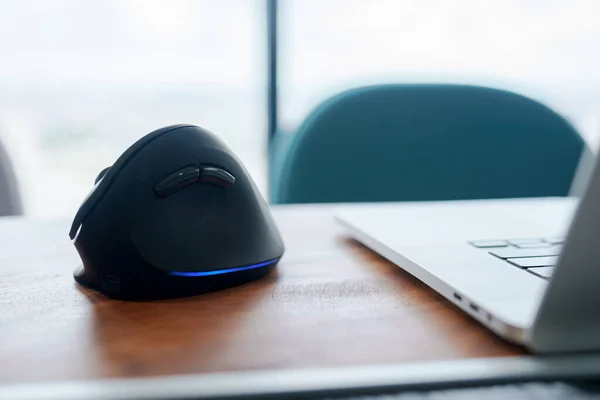 ergonomic mouse on desk at workplace, prevention wrist pain because working long time. De Quervain s tenosynovitis, Intersection Symptom, Carpal Tunnel Syndrome or Office syndrome concept