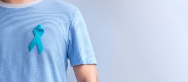 Blue November Prostate Cancer Awareness month, Man in blue shirt with Blue Ribbon for support people life and illness. Healthcare, International men, Father, Diabetes and World cancer day