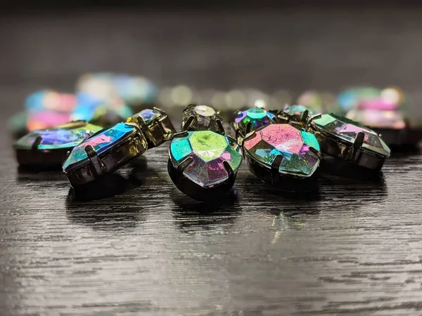 bracelet with colored crystals on a dark table close up