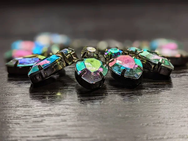 bracelet with colored crystals on a dark table close up