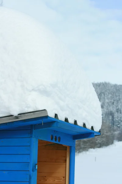 A lot of snow on blue dry closet — Stock Photo, Image