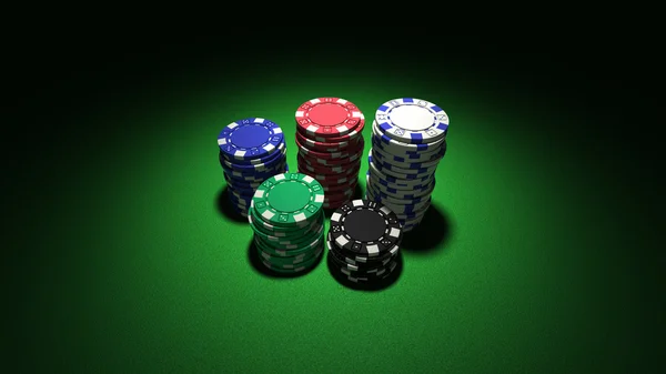 Kleine Stapel Pokerchips auf Grün — Stockfoto