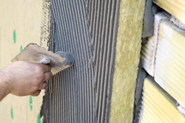 Application of coating over insulation — Stock Photo, Image