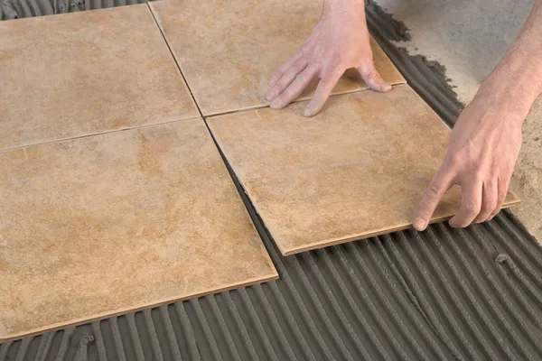 Master stick floor tiles — Stock Photo, Image