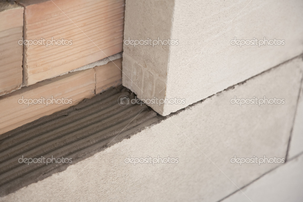 Tégla és ytong fal épÃtés alatt — stock fotó © dimitarmitev #25004173