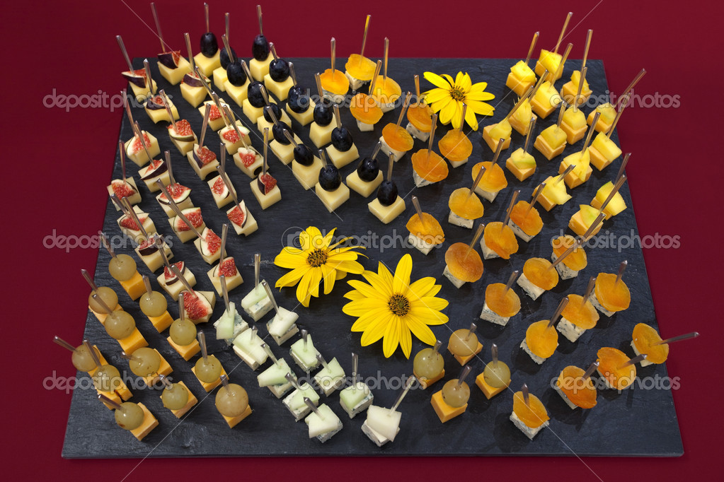 Canapes catering with fruit and cheese — Stock Photo © DimitarMitev