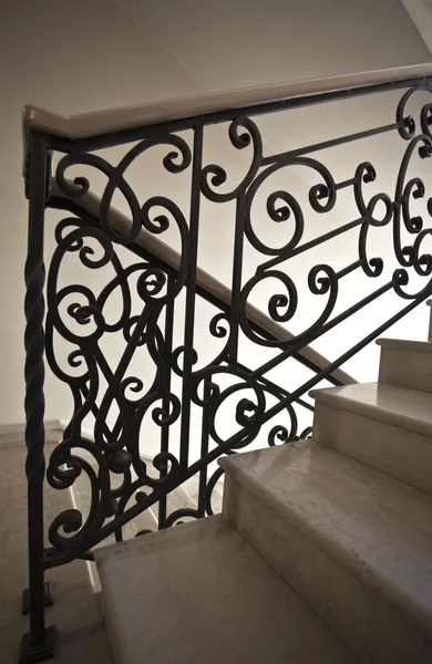 Staircase with wrought iron railing — Stock Photo, Image