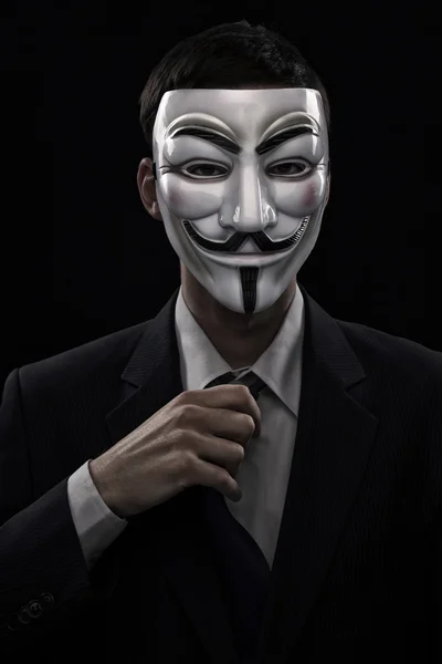 Anonymer Mann mit Maske und Kostüm — Stockfoto