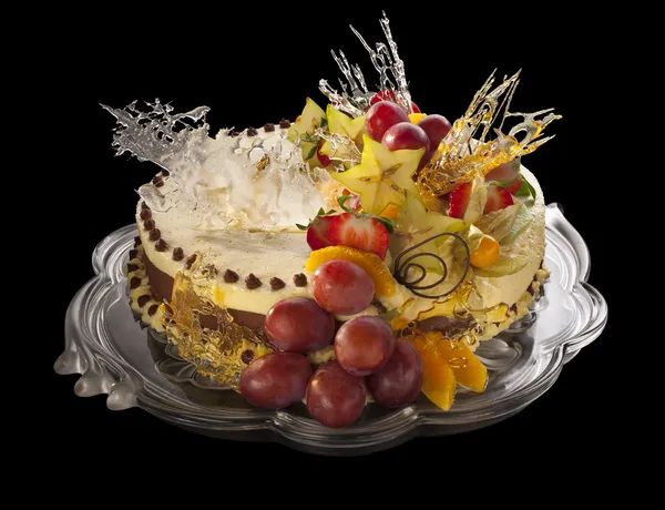mousse cake decorated with fruits