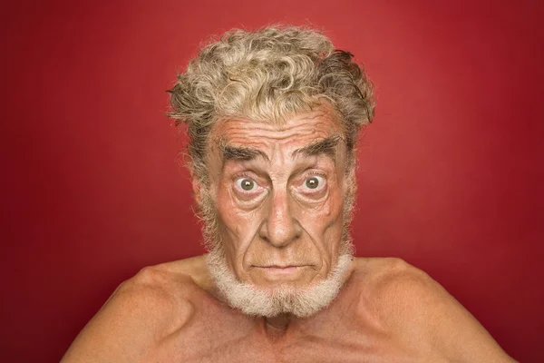 Portrait of an elderly man with facial expressions — Stock Photo, Image