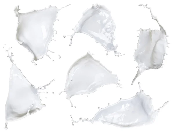 Leche blanca, salpicadura mixta aislada sobre fondo blanco — Foto de Stock