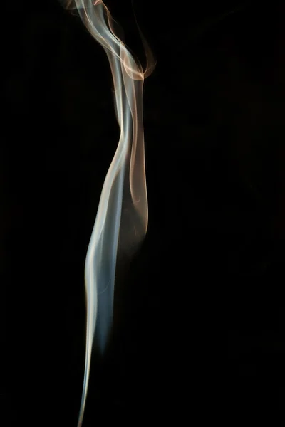 Abstract colored smoke isolated on a black background — Stock Photo, Image