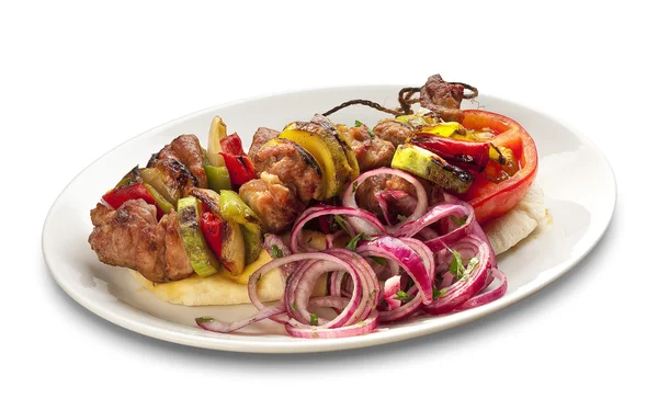 Kebab with vegetable on grilled bread — Stock Photo, Image