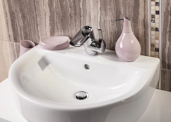 Detail of a modern bathroom with sink and accessories — Stock Photo, Image