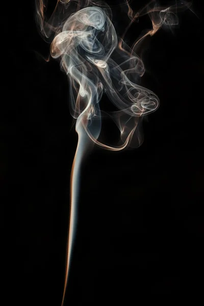 Colored smoke isolated on a black background — Stock Photo, Image