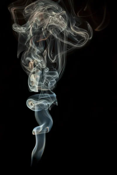 Colored smoke isolated on a black background — Stock Photo, Image