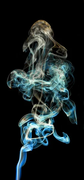 Colored smoke isolated on a black background — Stock Photo, Image