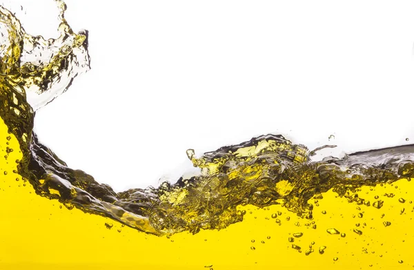 Αφηρημένη εικόνα του ένα κίτρινο υγρό χυθεί. σε λευκό φόντο — Φωτογραφία Αρχείου