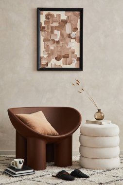 Modern elegnat living room interior design with creative armchair, mock up poster frame, pouf and stylish personal accessories. Copy space. Template.