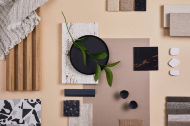 Creative flat lay composition of interior designer and architect moodboard. Textile and paint samples, lamella panels and lastrico tiles. Beige, black and green color palette. Copy space. Template.  clipart