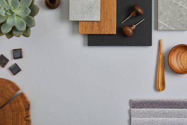 Perfect architect moodboard. Flat lay composition in light grey, black and brown color palette with textile and paint samples, wooden panels and tiles. Top view. Copy space. Template. clipart