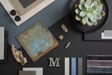 Creative flat lay composition with textile and paint samples, panels and tiles. Stylish interior designer moodboard. Black, blue, beige and dark grey color palette. Copy space. Template. clipart