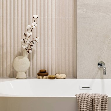 Modern bright bathroom with lamella wall. Big white bath with silver faucet, dried flowers and brown towel. clipart