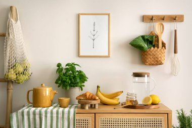 Interior design of kitchen space with rattan commode,  chair, herbs, vegetables, food and kitchen accessories in modern home decor. Mock up poster. Template. 