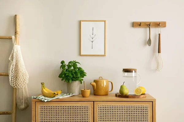 Interior design of kitchen space with mock up poster, rattan commode,  ladder, herbs, vegetables, food and kitchen accessories in modern home decor.  Template. 