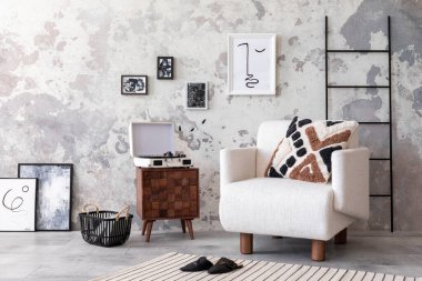 The stylish composition of living room interior with mock up, white armchair, wooden coffee table and personal accessories. Mock up poster. Home decor. Template. 