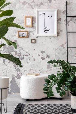 The stylish composition of living room interior with mock up, white pouf, plants and personal accessories. Mock up poster. Home decor. Template. 