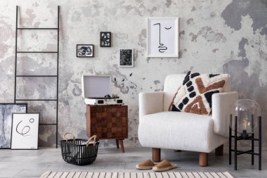The stylish composition of living room interior with mock up, white armchair, wooden coffee table and personal accessories. Mock up poster. Home decor. Template. 