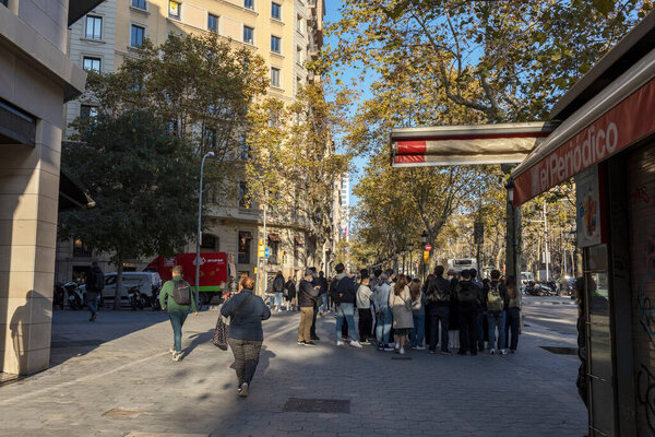 Barcelona, Spain - 22 December, 2021: Early morning in the city, people on the street
