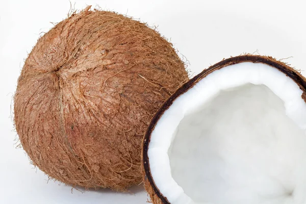 Closeup Coconut Whole Cut White Background — Zdjęcie stockowe