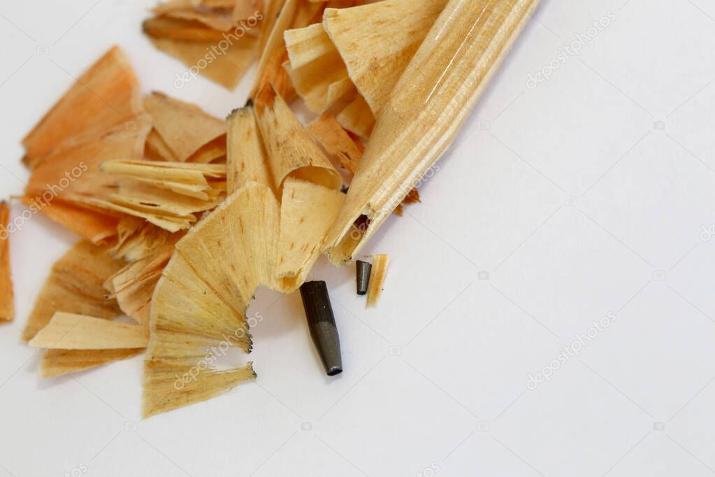 Stump of natural wood pencil with broken tip, on white background