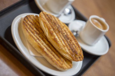 Espresso kahve fincan yağ dilim ekmek ve tereyağı ile