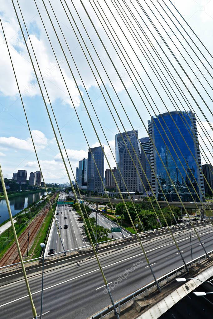 View of river and marginal roads with details of cable stayed bridge. Marginal Pinheiros, Sao Paulo, Brazil