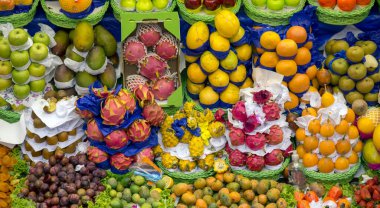 Markette bir sürü renkli meyve var. Sao Paulo şehrinin belediye pazarı, Brezilya