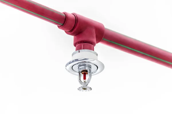 Fire sprinkler on red pipe — Stock Photo, Image