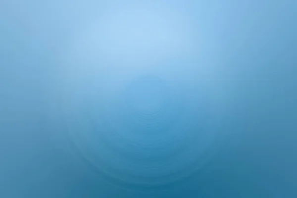 Desfoque radial de água azul gradiente liso — Fotografia de Stock