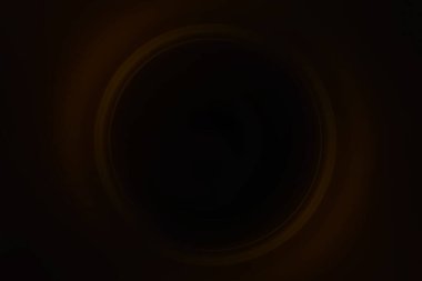 Siyah arkaplanda soluk turuncu dairesel bulanıklık