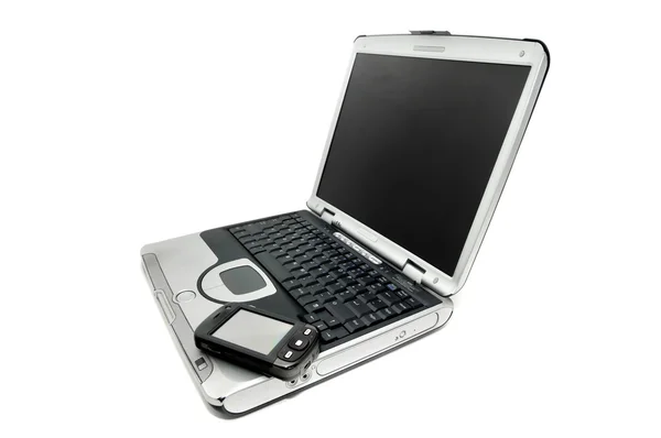 Laptop e celular — Fotografia de Stock