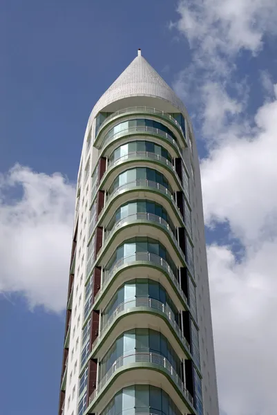Big modern building in Lisbon nations park — Stock Photo, Image
