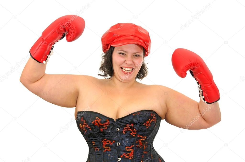Young large girl with boxing glove