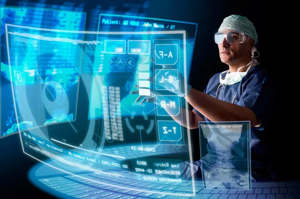 Doctor with screens — Stock Photo, Image