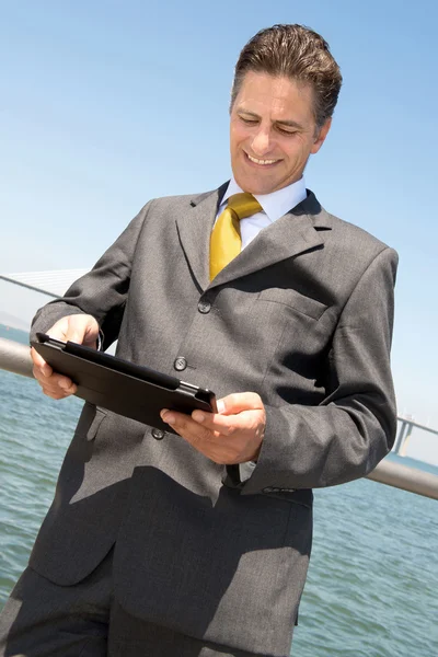 Businessman with tablet — Stock Photo, Image