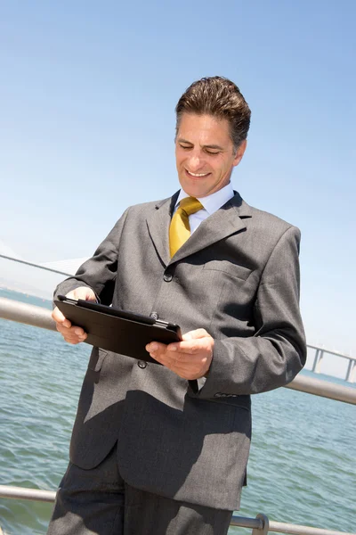 Businessman with tablet — Stock Photo, Image