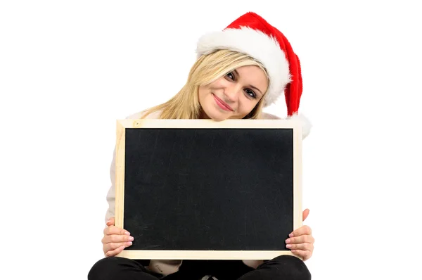 Woman in Christmas hat with board — Stock Photo, Image